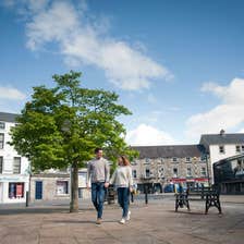 Image of a couple walking through Monaghan Town in County Monaghan