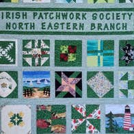 Exhibition: Thread Therapy, Irish Patchwork Society North Eastern Branch, a patchwork quilt mostly in shades of blue and green.