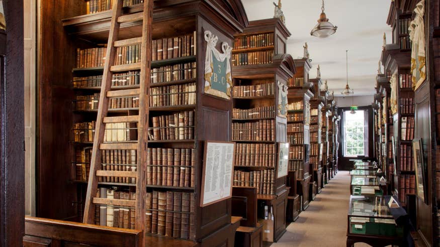 The wooden interior and leather-bound books of Marsh Library in Dublin