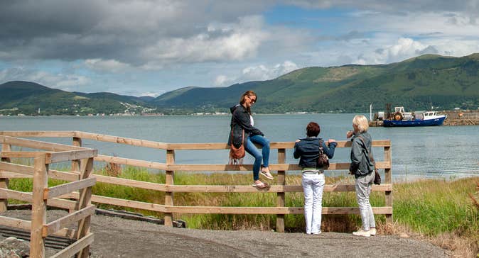 Three walkers enjoying the views from the Carlingford Greenway, County Louth