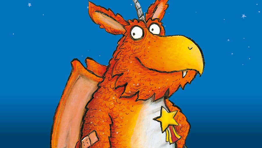 Cartoon image of a smiling orange dragon