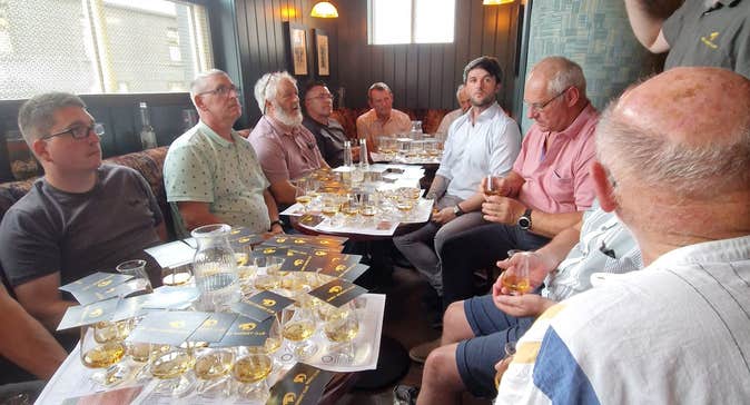A guided tasting in full flow at a Gorey Whiskey Club night. The festival brings eight ticketed sessions like this one to four venues across Gorey on 6 and 7 November 2026.