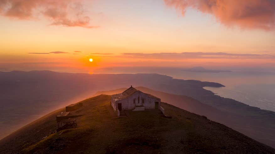 The summit of Croagh Patrick in Co Mayo at sunset