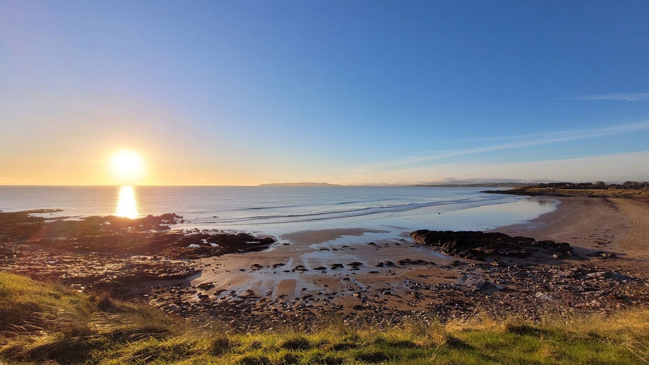 Sunset over a rocky beach