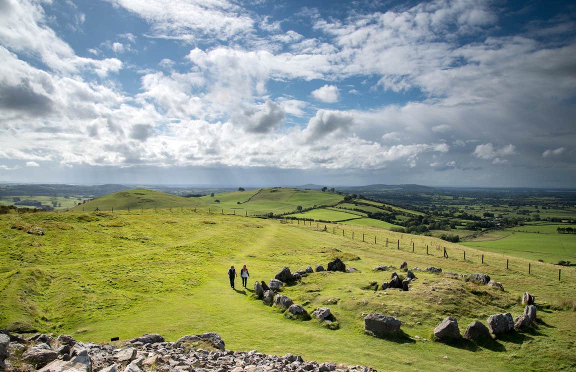 People exploring the Loughcrew Cairns in Co Meath