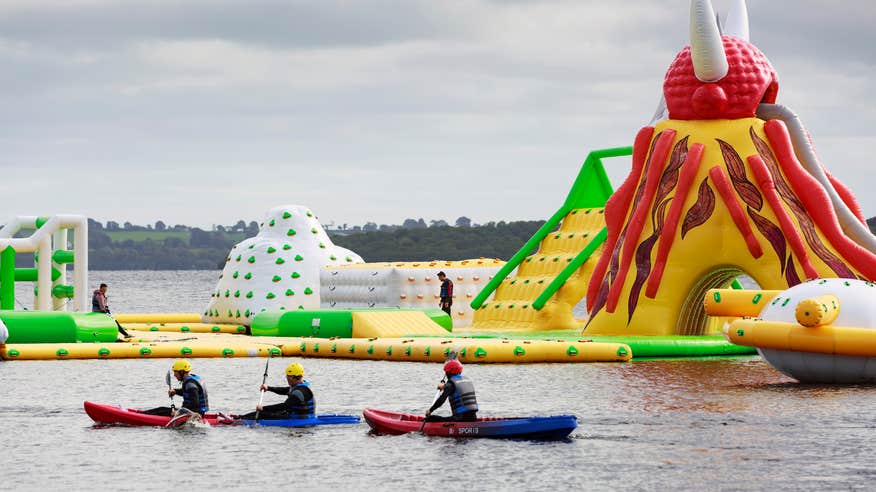 Three people kayaking at Baysports Waterpark in Athlone, County Westmeath