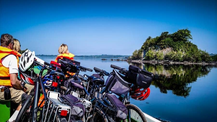 Cyclists view an island