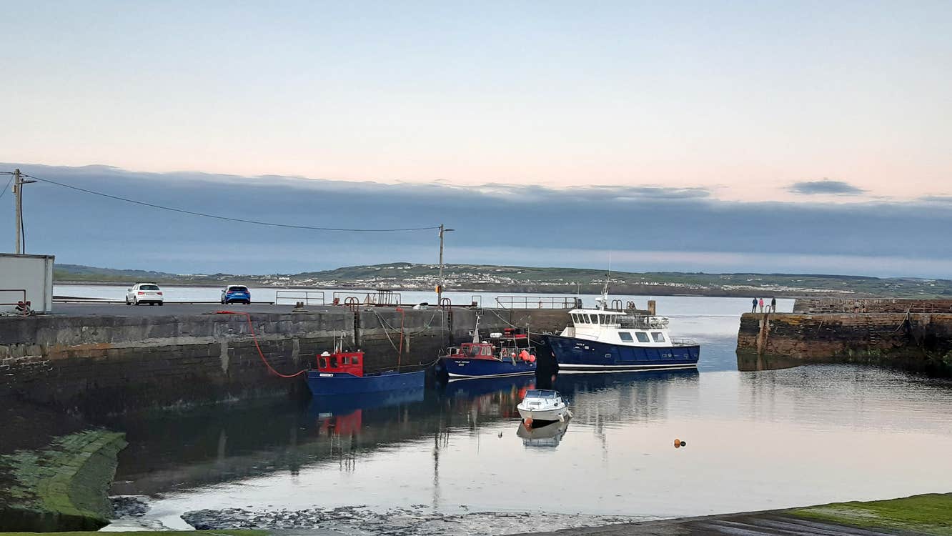 Boats docked at Liscannor Bay