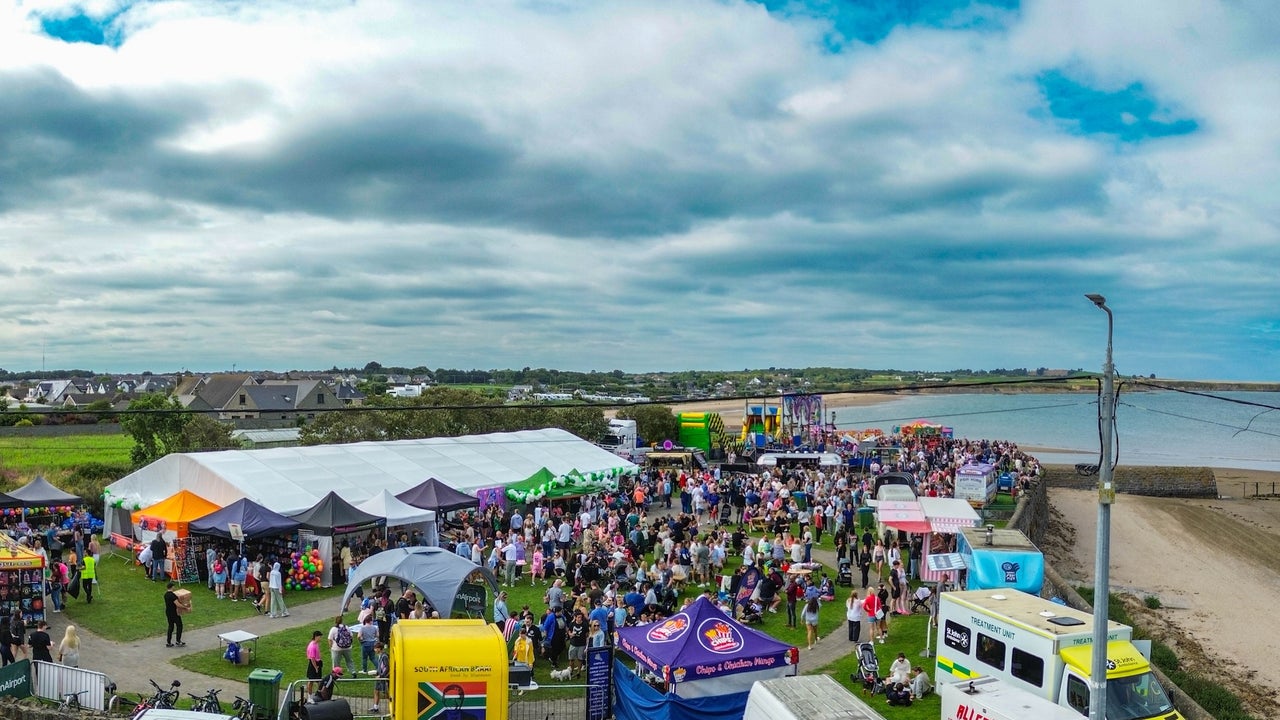 A busy festival park 2025