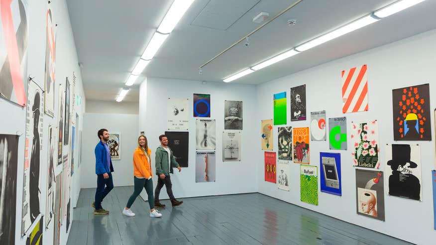 Three people in the Limerick City Gallery of Art.