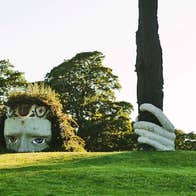 Dún na Sí Amenity and Heritage Park view of large ancient Celt head and hand sculpture