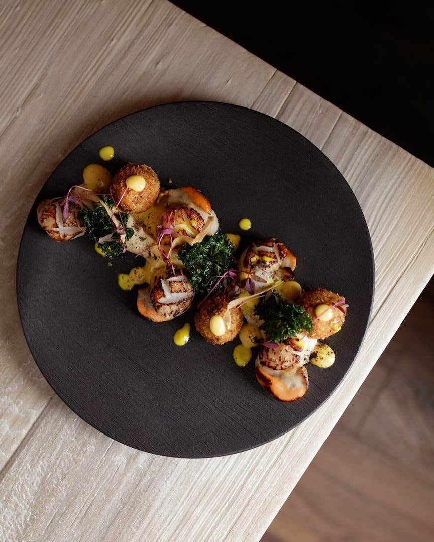 Overhead shot of a seafood dish, elegantly presented.