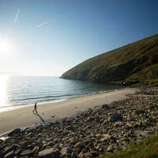 Image of walker on Keem Beach, Achill Island, County Mayo