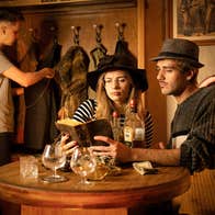 People in costume in an escape room