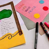 Bealtaine Workshop for Older Adults: Scents of Life, looking down at simple art works on a table with some pens.