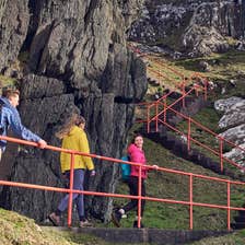 People hiking the Sheep's Head Trail in Co Cork