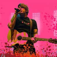A man with a guitar singing into a mic with pink background and splashed colours across the bottom edge.