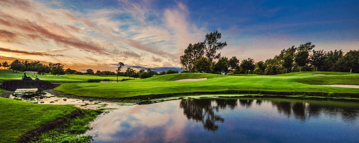 A view of the water feature and greens at St Margaret's Golf & Country Club