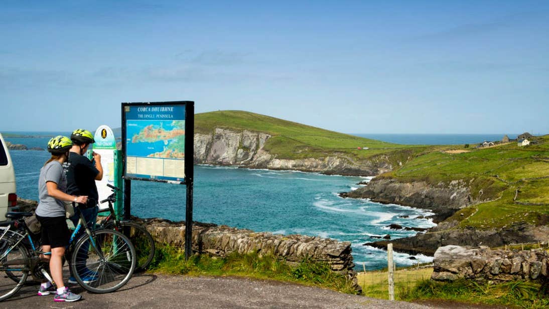 Cyclists on the road overlooking Slea Head , Co. Kerry