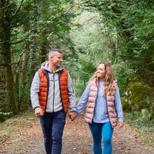 A couple walking the Connemara Greenway in Co Galway