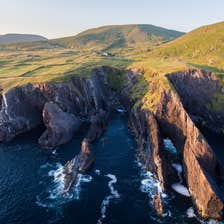 Green fields and cliffs at Skellig Ring, Co. Kerry