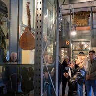 A tour group in the Out of Storage gallery