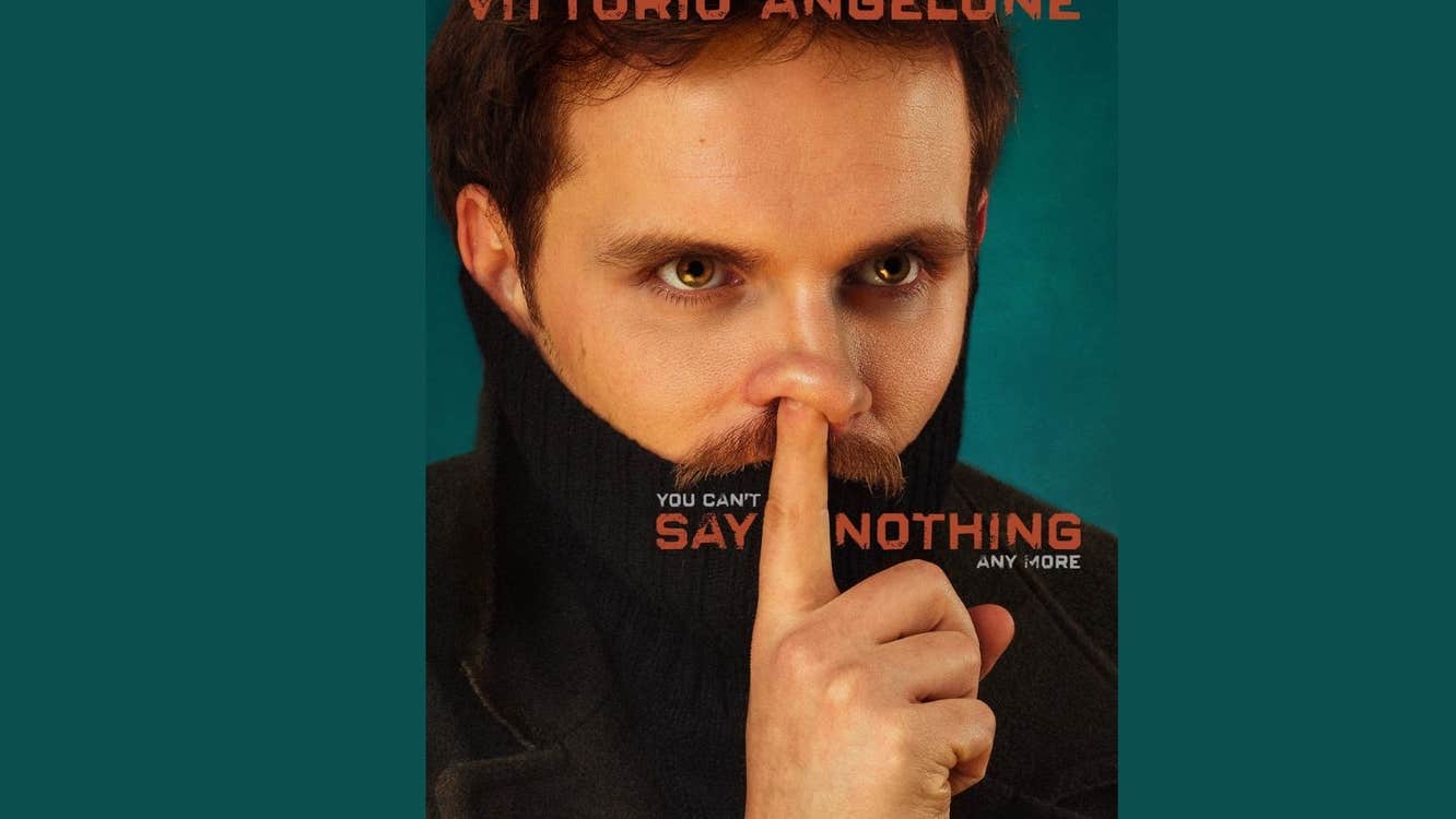 Vittorio Angelone 'you can’t Say Nothing any more', close up view of man with one finger up his right side nostril.