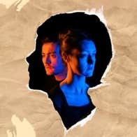 Play Poison by Lot Vekemans - silhouette of profile of a head in black containing faces for 2 sad people facing opposite directions.