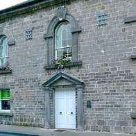 The exterior of a period building that is the Linenhall Arts Centre