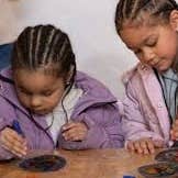 Children engaging with arts and crafts activity