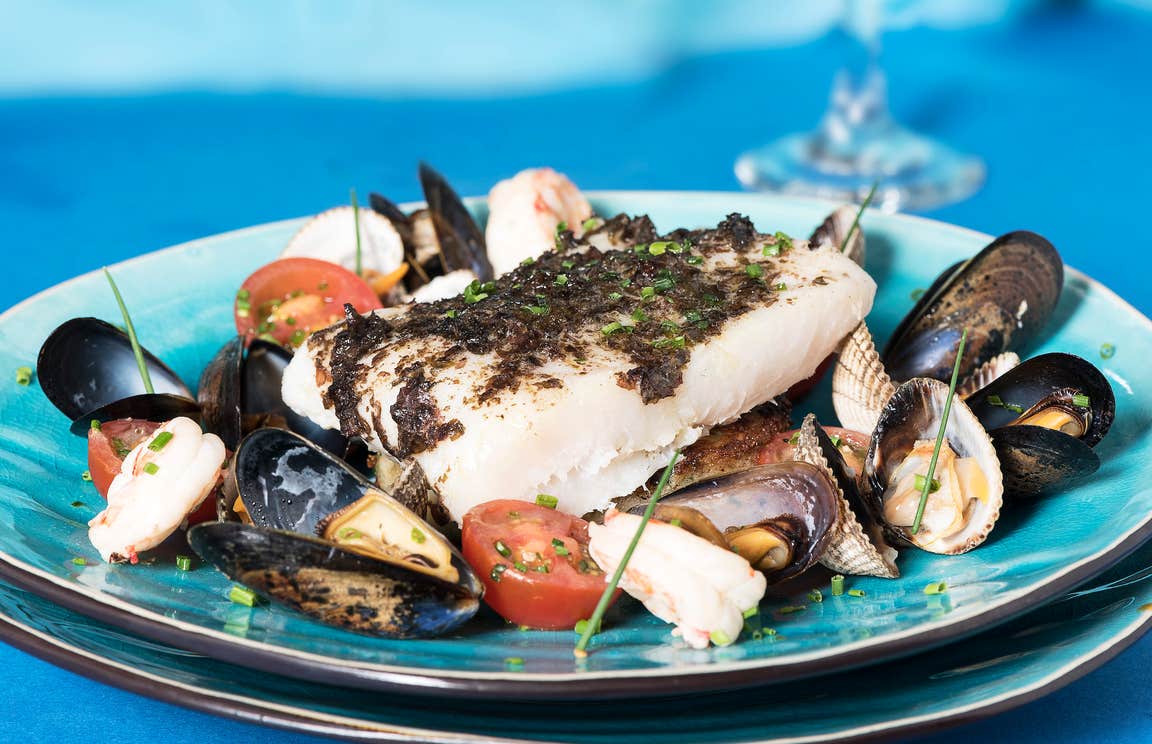 Seafood and shellfish served on a plate.