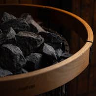 Close up of sauna stones on a sauna stove