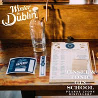 The Gin School set up with worksheet, bottle, label & copper pot still.