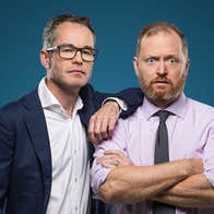 W*nkernomics, Just Touching Base - 2 men in work shirts, one looking shocked.