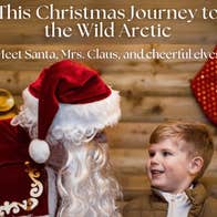A Santa talking to a young boy