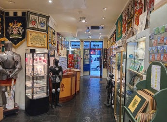 Shop interior with lots of heraldic items for sale