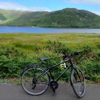 Bike from Sea Breeze Bike Hire parked by a lake