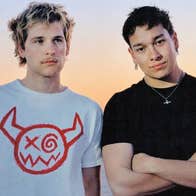 Joey Valence & Brae, 2 men in T-shirts with desert behind.