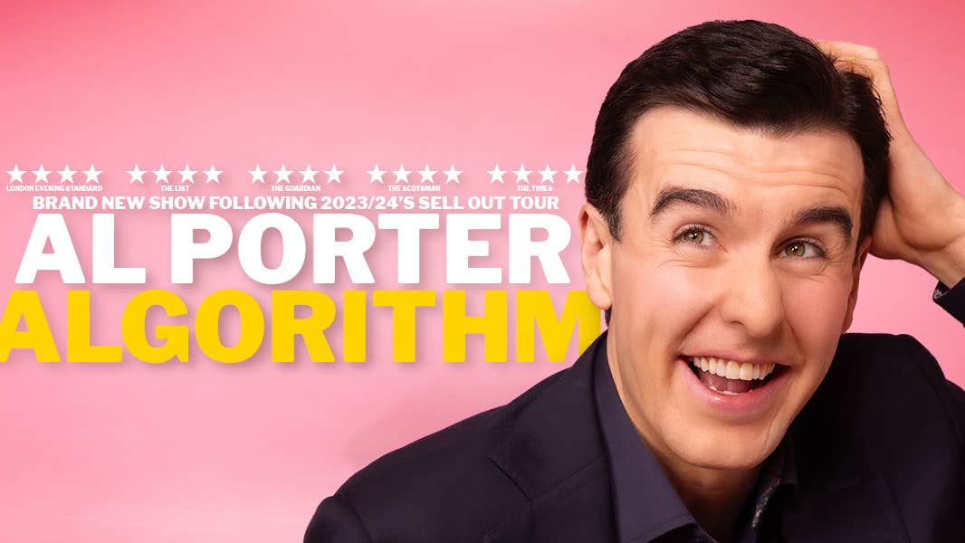 A smiling man scratching his head, against bright pink background.