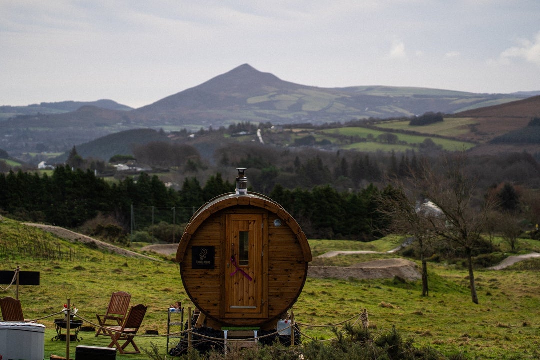 An outdoor sauna with a view of the Dublin Mountains