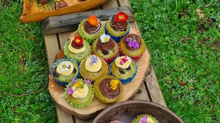Three bowls of sweet treats at a picnic