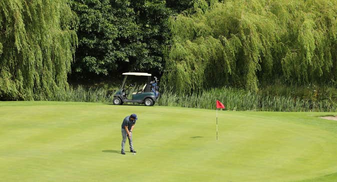 Gentleman playing golf at Bellewstown Golf Club