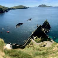 Man standing beside cliff edge