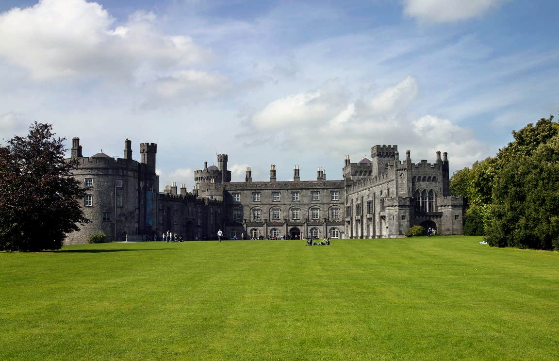 Blue skies and green grass at majestic Kilkenny Castle