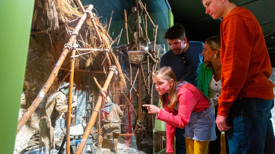 A family viewing exhibitions in King John's Castle in Limerick.