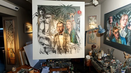 A painting in the making in an art room with paint brushes and paints around it