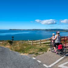 Cyclists taking in the scenic views at Waterford Greenway County Waterford 