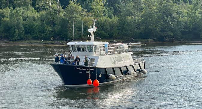 A tour boat with passengers at sea