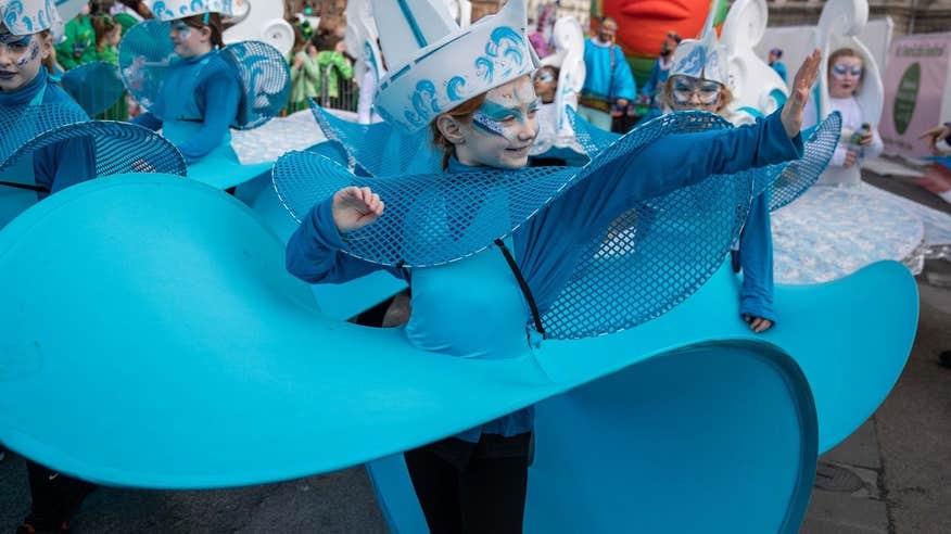 A child performing at the 2024 St Patrick's Day Festival in Dublin city