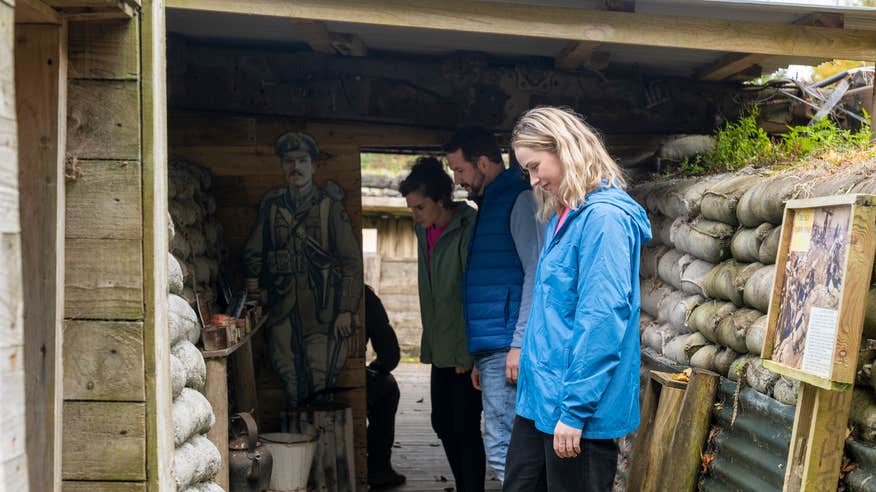 People in the replica trench in Cavan County Museum in County Cavan